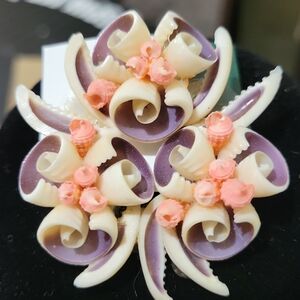 Elegant Floral Brooch with Purple and Cream Accents